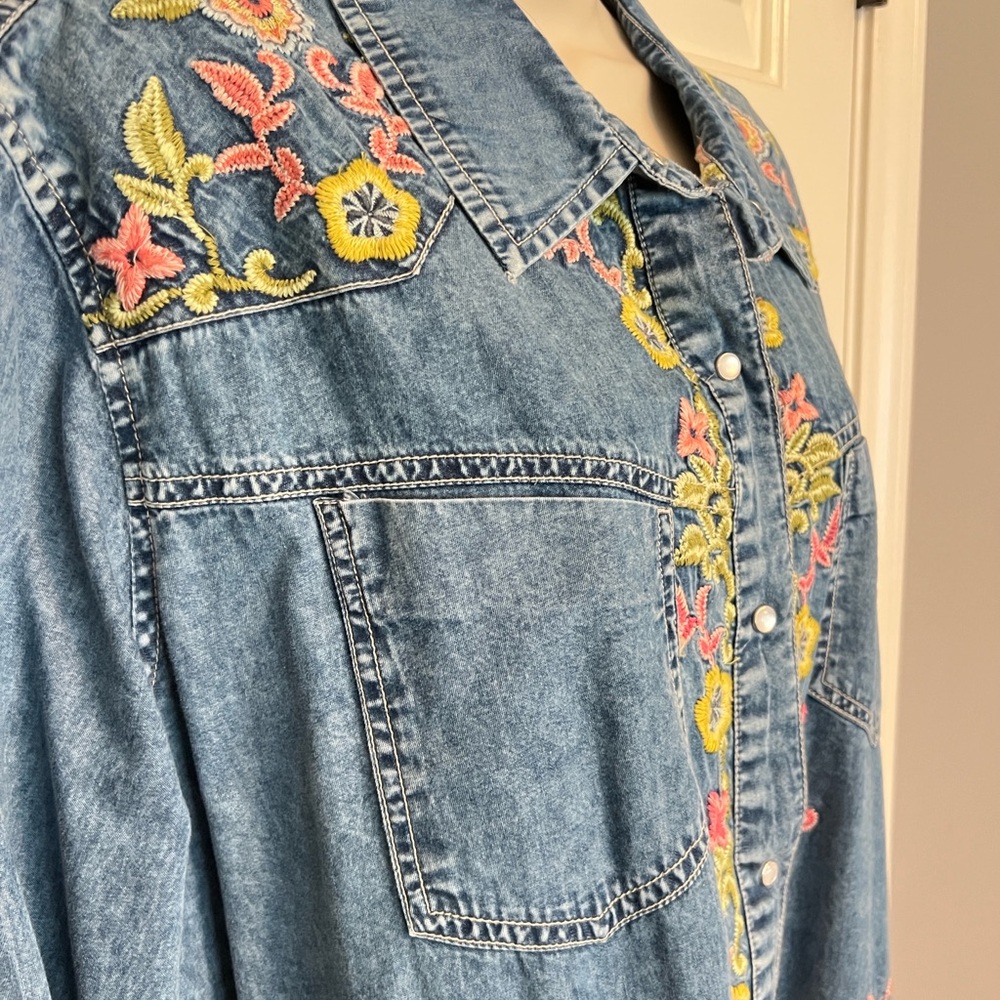 Denim dress - floral embroidery, pearl snap closures, and bottom fringe.